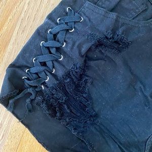 Aphrodite Black Shorts. Shredded and Laced. Silver Eyelets. High Rise. Jeans